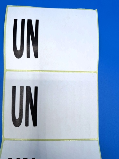 [MP005] ETIQUETA ADHESIVA BLANCA TEXTO UN ______- Bobina 1.000 uds